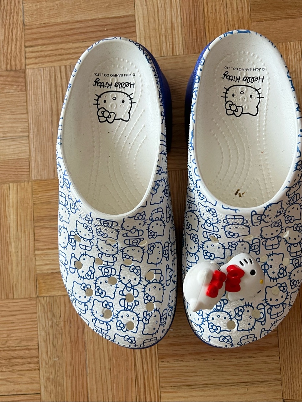 Hello Kitty White & Blue Patterned Slip-On Crocs with Red Bow Charm